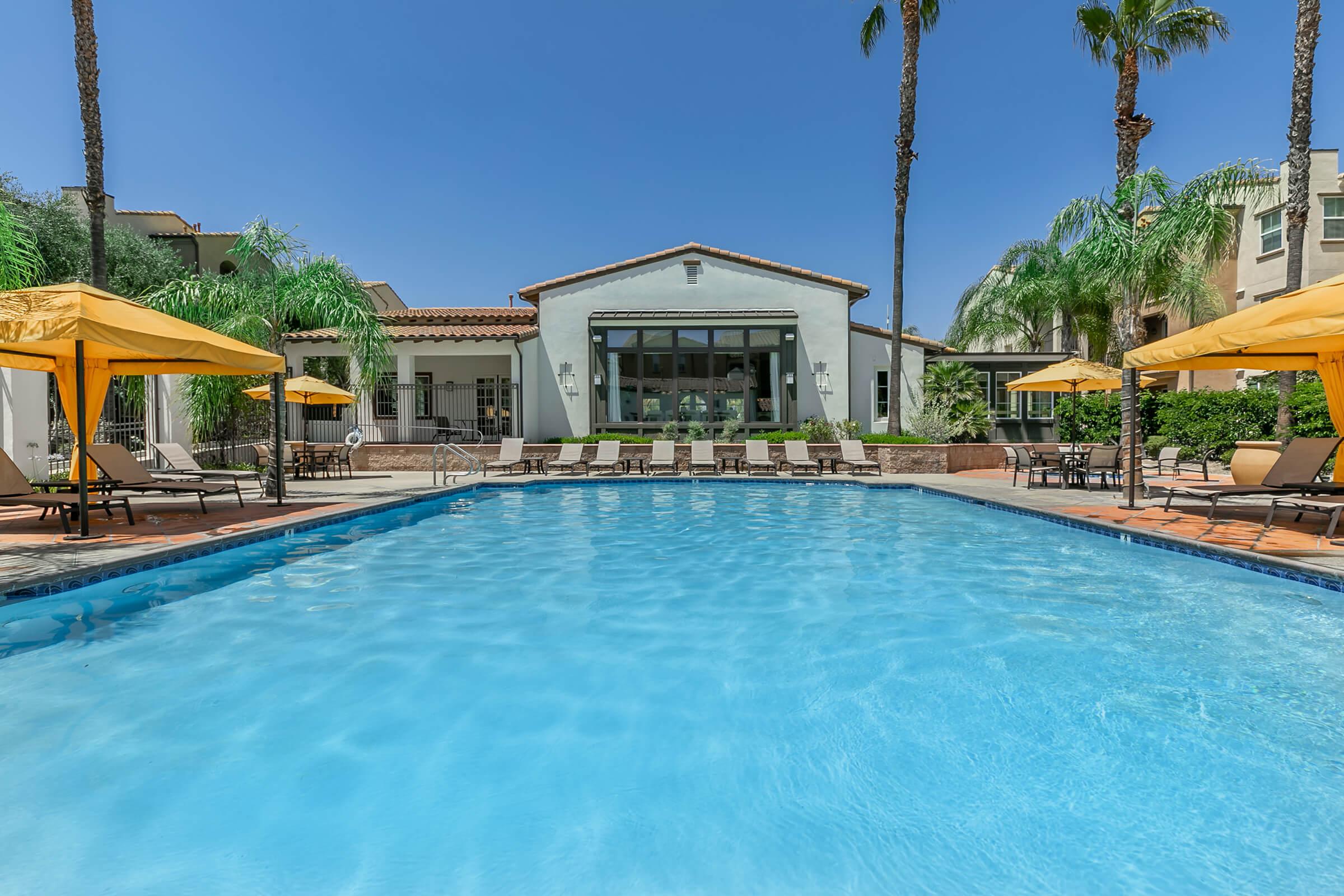 swimming pool and clubhouse at College Park Apartments